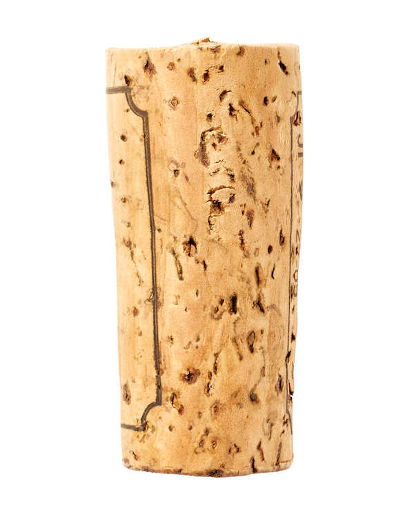 Standard wine cork on a white background