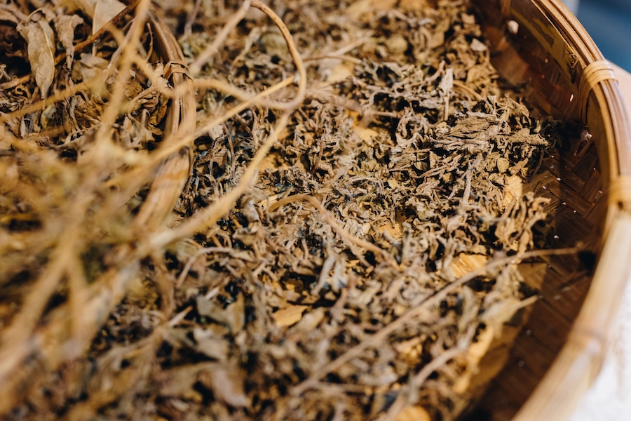 Large basket of dried brown herbs