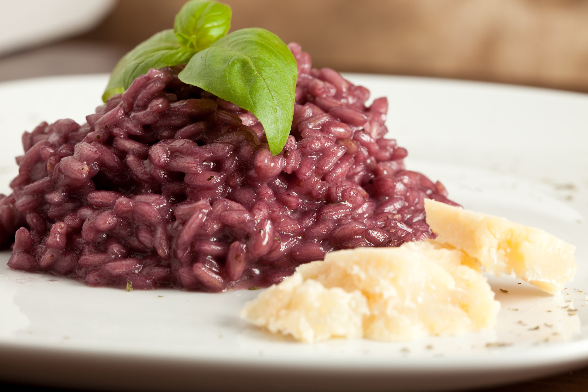 Purple-colored risotto on a plate