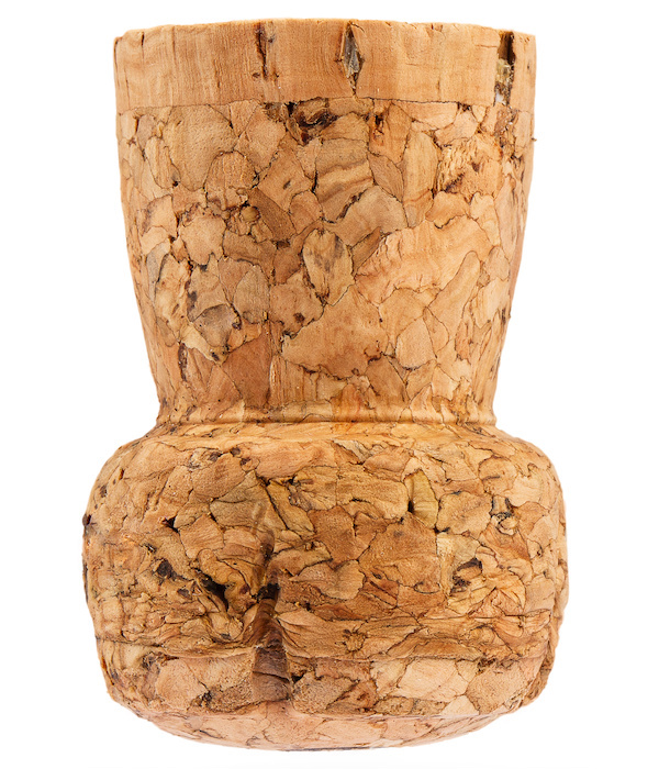 Champagne cork on white background