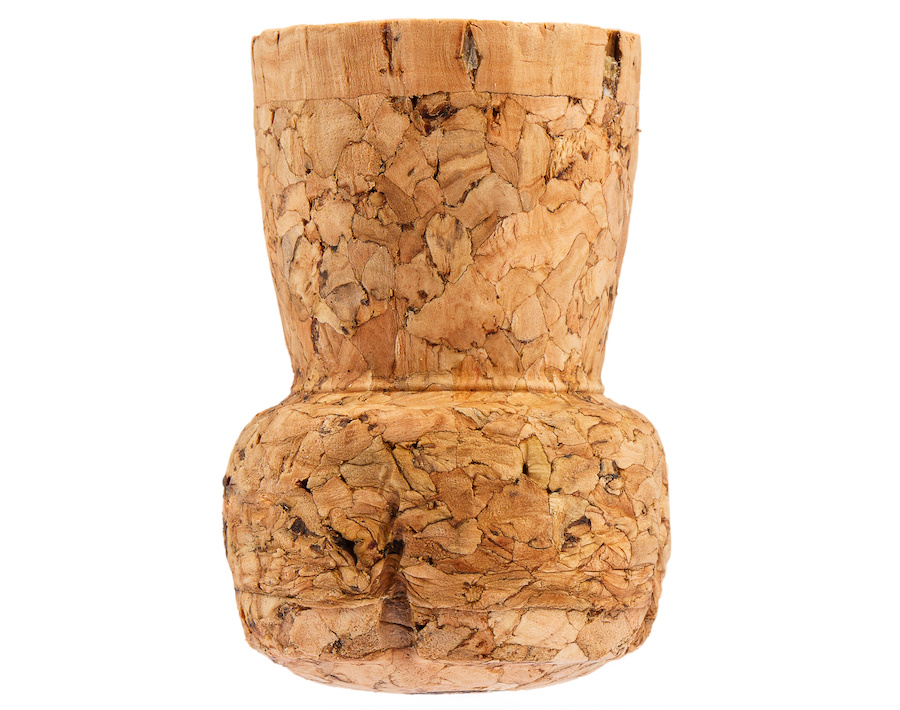 Champagne cork on white background