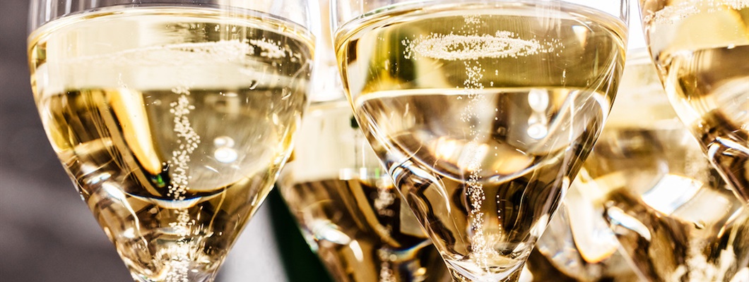 Glasses of sparkling wine with visible bubbles