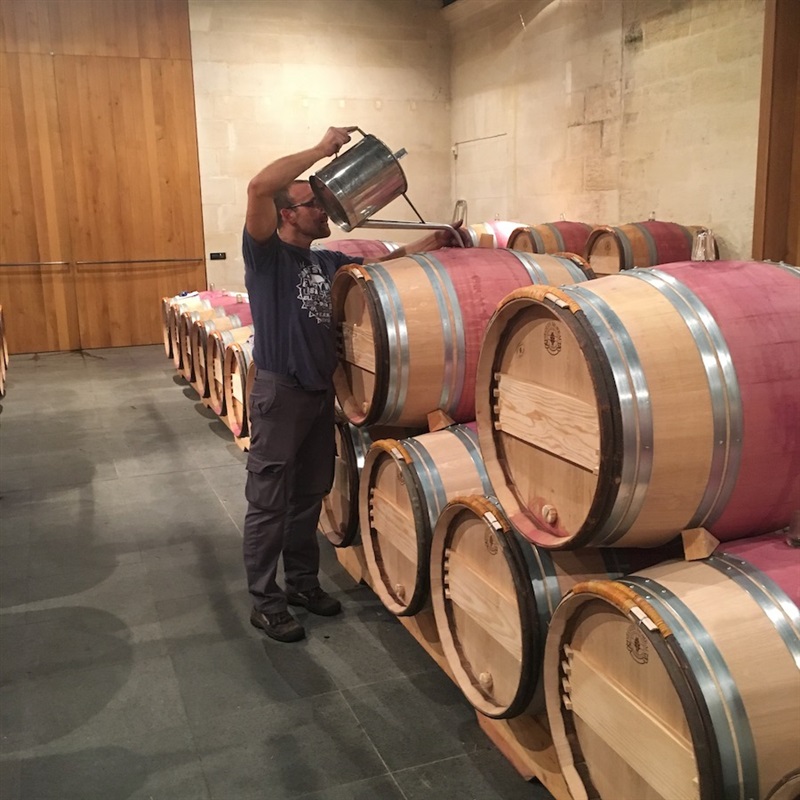 Topping replaces wine lost due to evaporation.